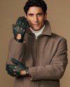 Men’s dark green lambskin driving gloves with touchscreen pads and button detail