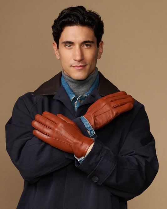 Cognac goatskin leather gloves with wool lining and touchscreen tips, shown