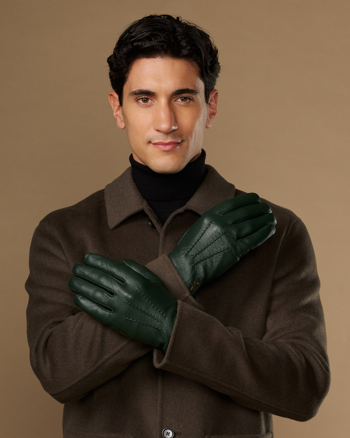Men's dark green leather gloves, full hand coverage with stitched seams