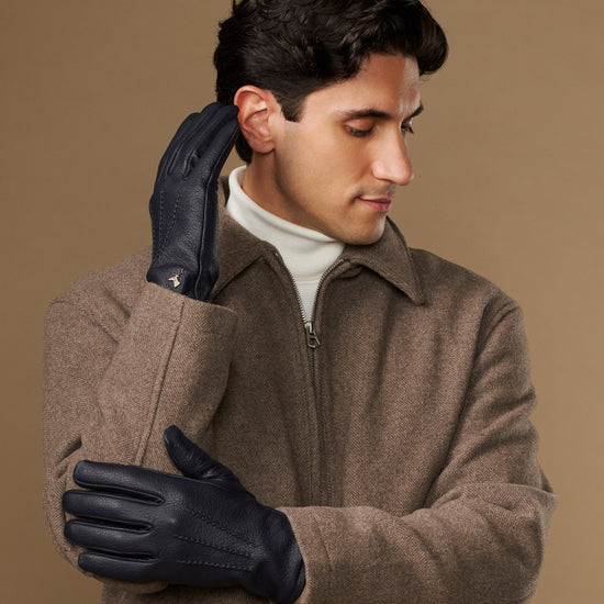 Men's navy goatskin leather gloves with wool lining, stitched finger and palm design