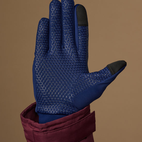 Blue activity glove with hexagonal grip pattern and touchscreen fingertips