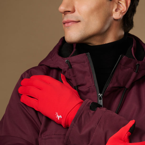 Red men's activity glove with smooth back and small white wrist logo