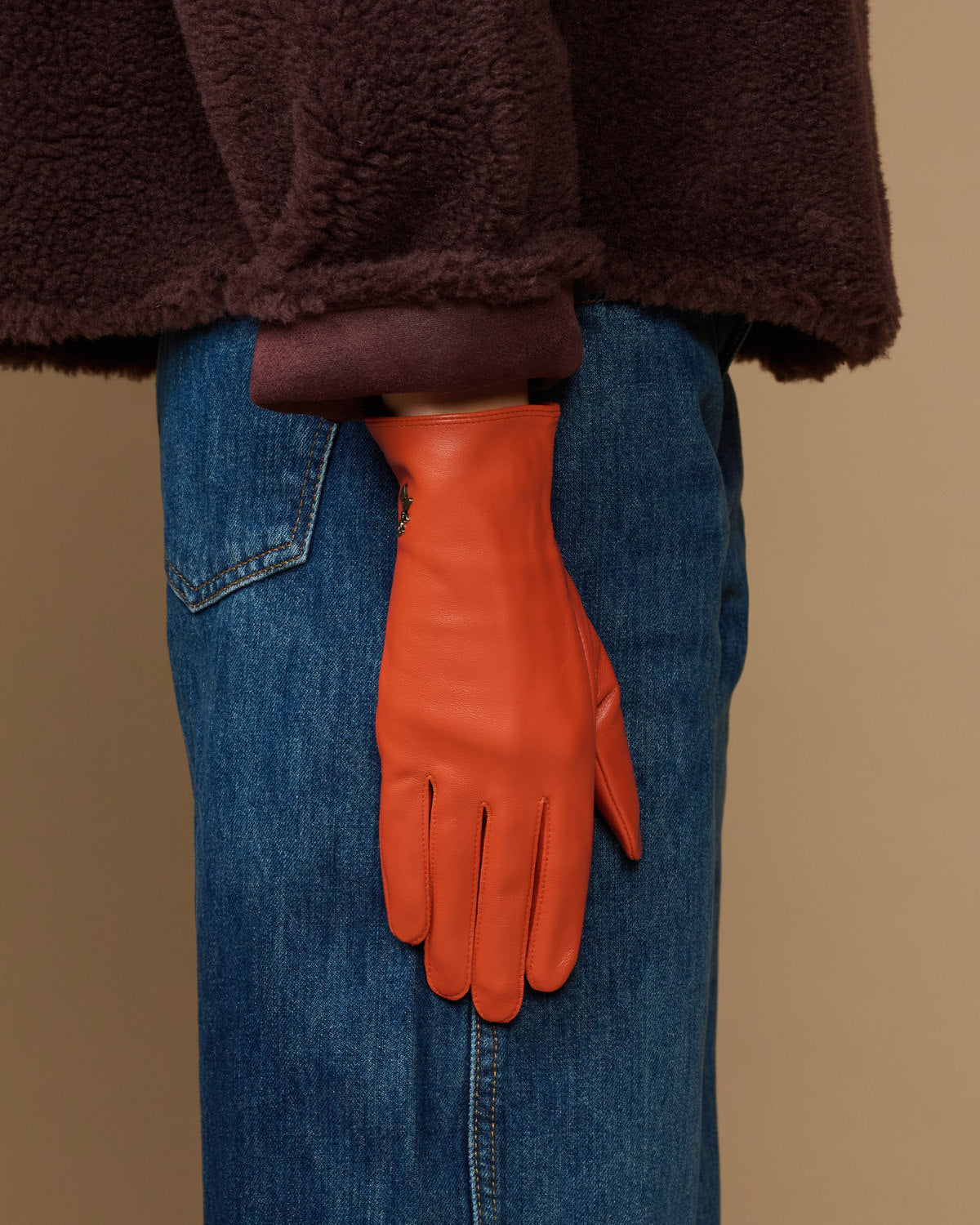 Lauren orange lambskin leather glove with touchscreen tip, silk-lined, hanging cuff