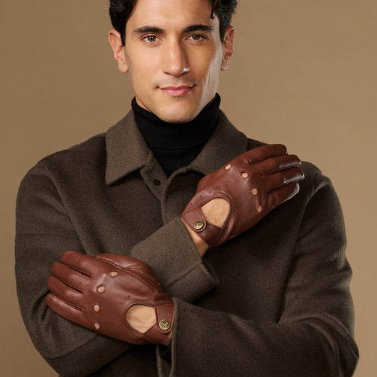 Men's brown leather driving gloves with stud details and touchscreen patch
