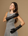 Black below-elbow leather gloves with ruched cuffs, glossy texture, touchscreen fingertips