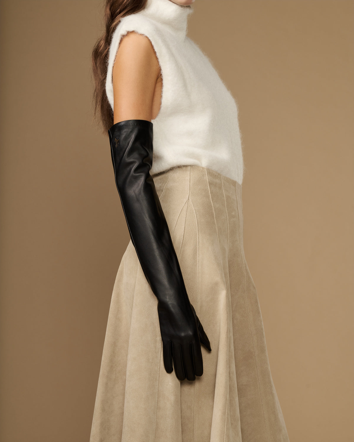 Black long leather glove with visible inner silk cuff lining