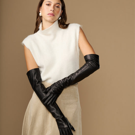 Black leather gloves with long cuffs and soft silk lining edge