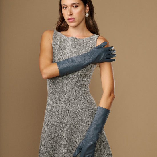 Women’s grey below-elbow leather gloves with long cuffs and curved finger shaping