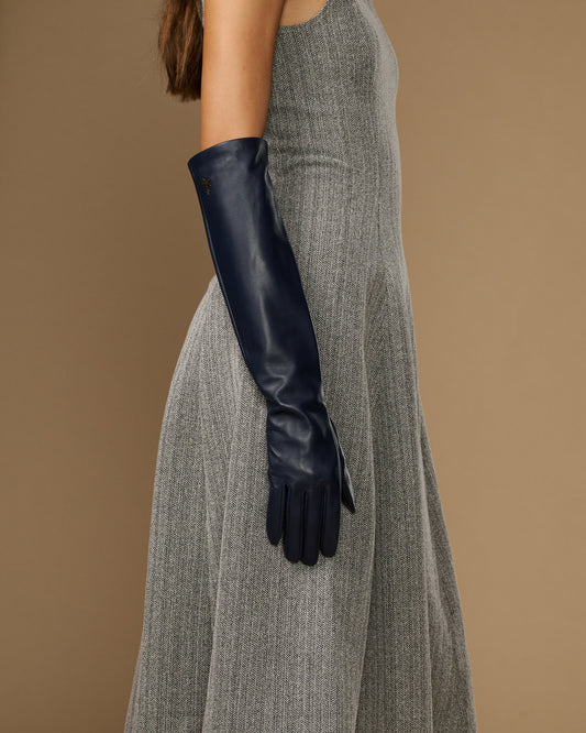 Women's blue leather elbow gloves with fitted cuffs and finger openings