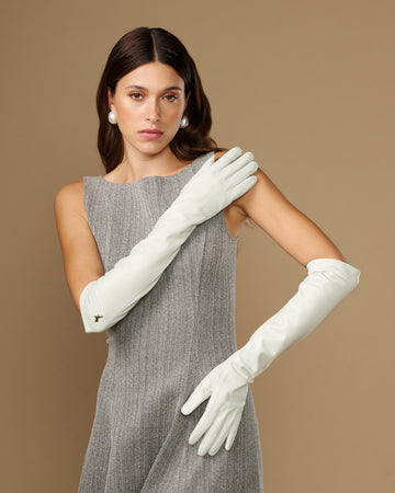White elbow-length leather gloves with smooth finish and fitted finger shape