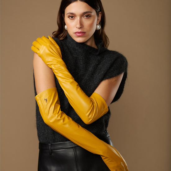 Yellow lambskin leather opera gloves with silk lining, long fitted style